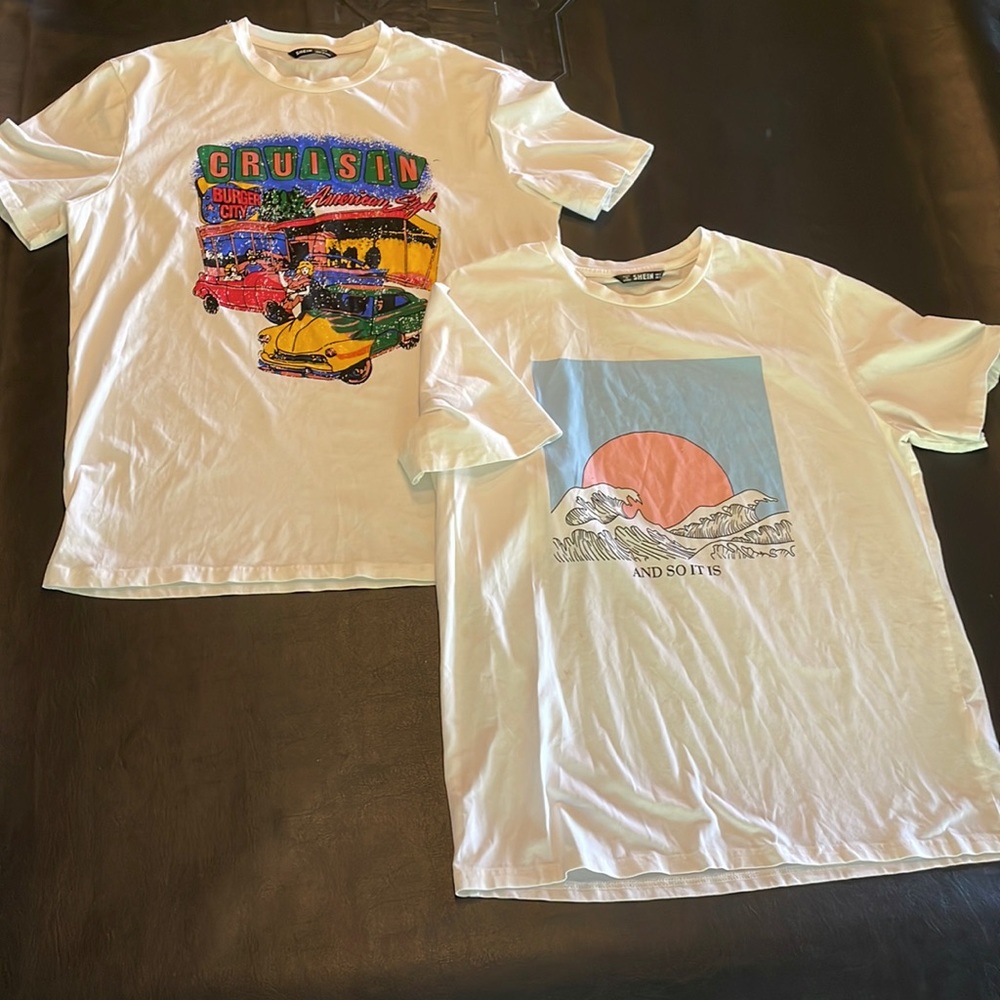 2 white shirts with graphic designs